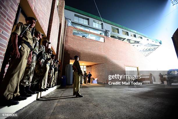 Security personnel can be seen at guard at the Dhyan Chand Nation Hockey Stadium during the pool B match of India against Pakistan at the Hockey...