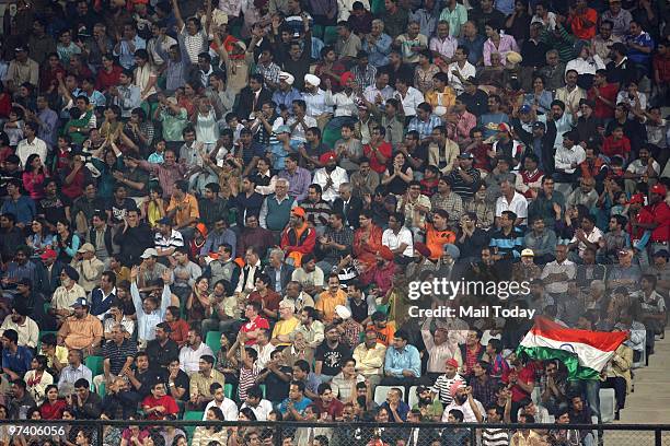 The Spectators cheer on the teams at the pool B match of India against Pakistan at the Hockey World Cup in New Delhi on February 28, 2010.