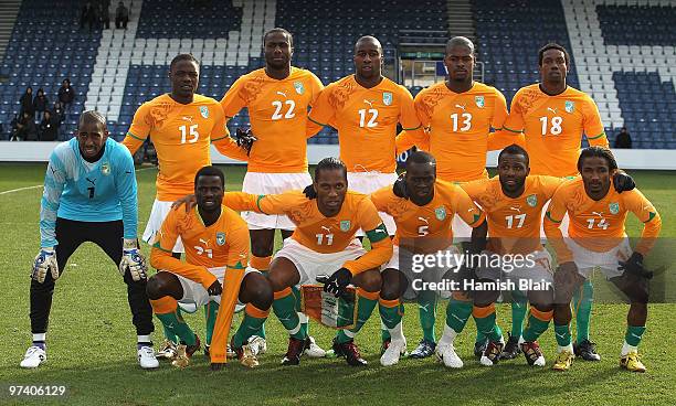 The Ivory Coast team pose for a photo ahead of the International Friendly match between Ivory Coast and Republic of Korea played at Loftus Road on...