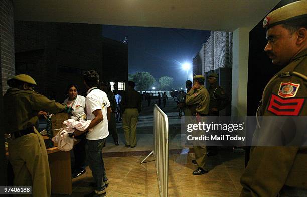 Security personnel can be seen at guard at the Dhyan Chand Nation Hockey Stadium during the pool B match of India against Pakistan at the Hockey...