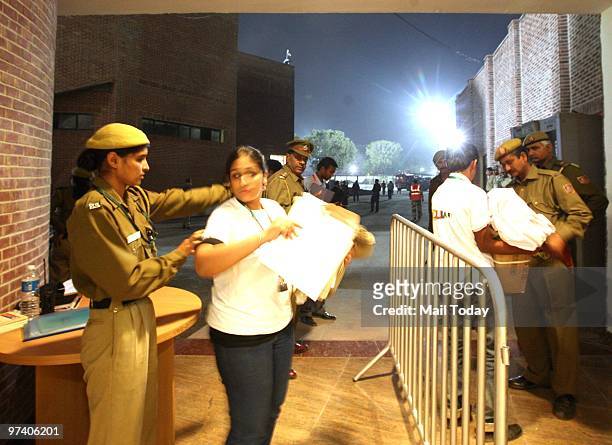 Security personnel can be seen at guard at the Dhyan Chand Nation Hockey Stadium during the pool B match of India against Pakistan at the Hockey...