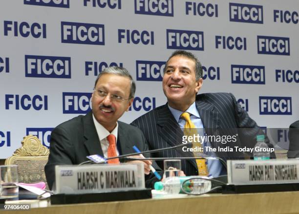 Industrialists at FICCI watch Finance Minister Pranab Mukherjee as he presents Union Budget 2010-11 at the Lok Sabha in New Delhi on February 26,...