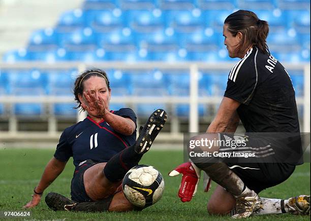 Nadine Angerer of Germany and Lauren Cheney of USA battle for the ball during the Women Algarve Cup match between Germany and USA on March 3, 2010 in...