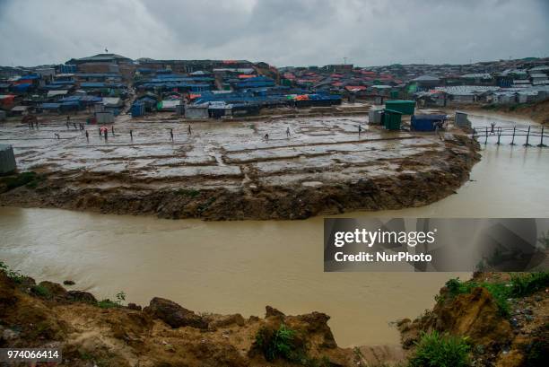 Group of rohingya refugee is playing football on the empty ground rohingya makeshift shelterr at kutupalong in Coxs Bazar, Bangladesh on June 13,...