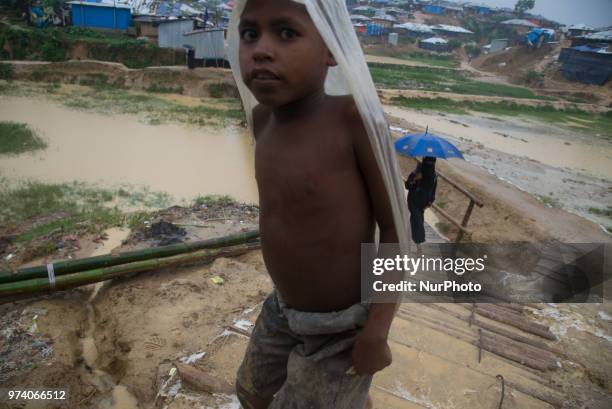 Child into the Rohingya makeshift shelterr at kutupalong in Coxs Bazar, Bangladesh on June 13, 2018.