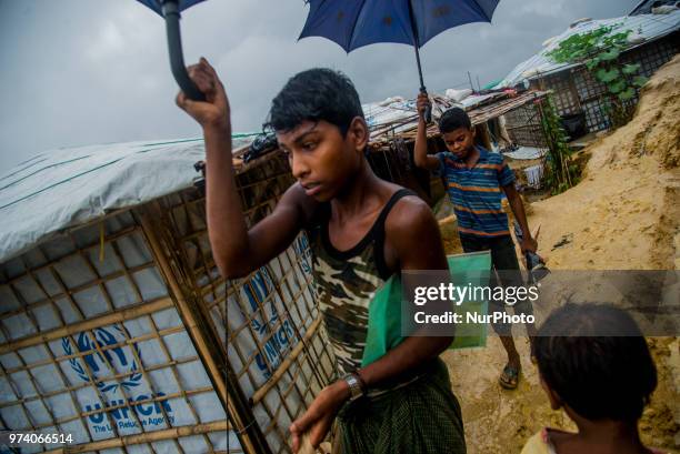 Child inside the Kutupalong makeshift shelter in Coxs Bazar, Bangladesh on June 13, 2018. Around one million Rohingya Refugees has taken shelter on...