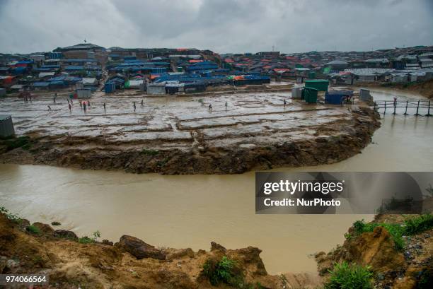 Group of rohingya refugee is playing football on the empty ground rohingya makeshift shelterr at kutupalong in Coxs Bazar, Bangladesh on June 13,...