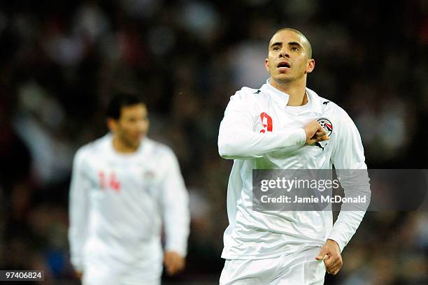 Mohamed Zidan of Egypt celebnrates as he scores their first goal during the International Friendly match between England and Egypt at Wembley Stadium...
