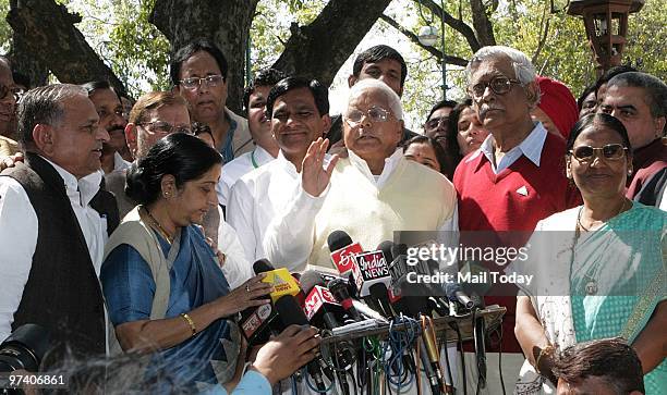 Opposition leaders Sushma Swaraj, Sharad Yadav, Mulayam Singh Yadav, Lalu Prasad Yadav and Gurdas Dasgupta talk to the media after they walked out of...