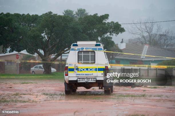 Graphic content / A picture taken on June 14, 2018 in Malmesbury, an agricultural town about 50Km north of Cape Town shows the body of a man alleged...