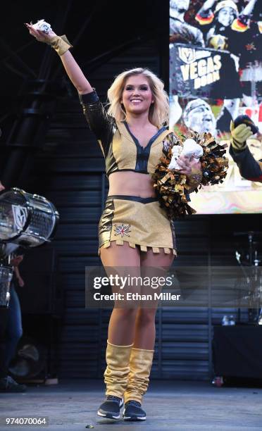 Member of the Vegas Golden Knights Golden Aces throws T-shirts to fans during the team's "Stick Salute to Vegas and Our Fans" event at the Fremont...