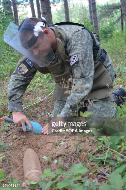 The Kosovo Security Force Emergency Ordinance Disposal team clear unexploded mines and shells in Freedom Park near Prizren, southern Kosovo. Kosovo...