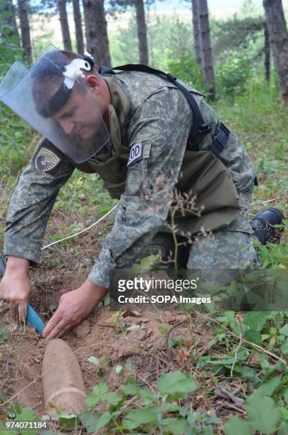 The Kosovo Security Force Emergency Ordinance Disposal team clear unexploded mines and shells in Freedom Park near Prizren, southern Kosovo. Kosovo...
