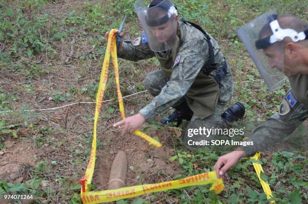 The Kosovo Security Force Emergency Ordinance Disposal team clear unexploded mines and shells in Freedom Park near Prizren, southern Kosovo. Kosovo...