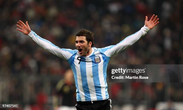 Gonzalo Higuain of Argentina celebrates scoring his team's opening goal during the International Friendly match between Germany and Argentina at the...