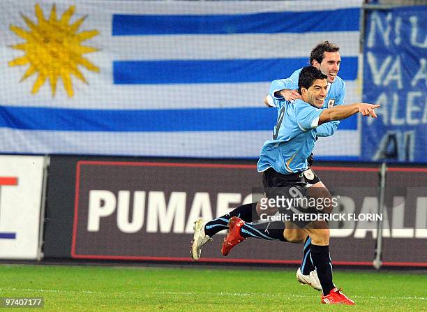 Uruguay's Luis Suarez jubilates after scoring during the World Cup 2010 friendly football match Switzerland vs Uruguay at AFG Arena stadium on March...