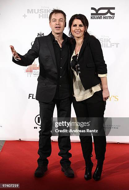 Comedian Michael Mittermeier and his wife, singer Gudrun Mittermeier attend the 'Musik Hilft' charity dinner at Grill Royal on March 3, 2010 in...