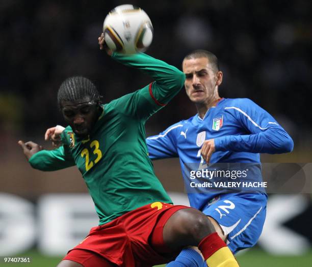 Cameroon's Dorge Kouemaha vies with Italy's Leonardo Bonucci during their friendly football match Italy vs Cameroon, on March 03, 2010 at Louis II...