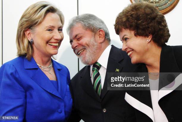 Secretary of State Hillary Rodham Clinton greets Brazil's President Luiz Inacio Lula da Silva and chief-of-staff Dilma Rousseff as part of her...