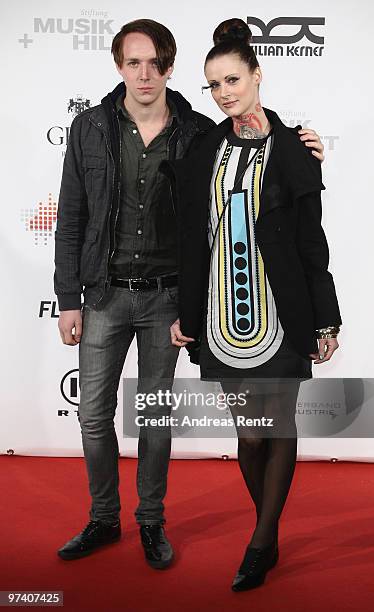 Singer Jennifer Weist and Johannes 'Joe' Walter of Jennifer Rostock attend the 'Musik Hilft' charity dinner at Grill Royal on March 3, 2010 in...