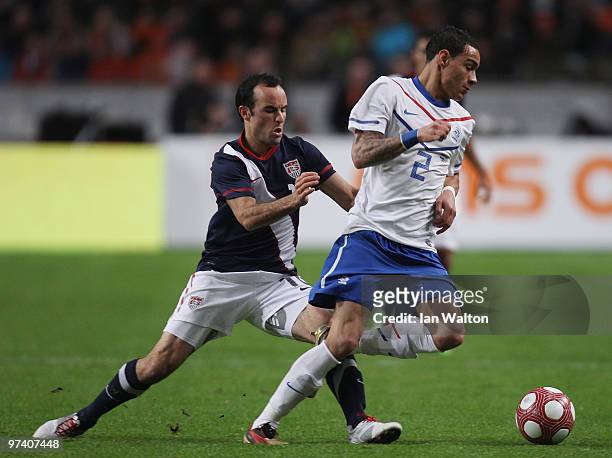 Jonathan Spector of USA tries to tackle Gregory Van der Wiel of the Netherland during the International Friendly between Netherlands and USA at the...