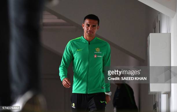 Australia's forward Tim Cahill leaves after a press conference in Kazan on June 14 ahead of the Russia 2018 World Cup football tournament. - Cahill...