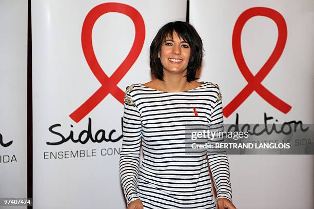 French TV host Estelle Denis poses as she arrives on March 3, 2010 in Paris to launch the 16th edition of French Sidaction, an AIDS awareness and...