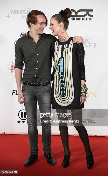 Singer Jennifer Weist and Johannes 'Joe' Walter of Jennifer Rostock attend the 'Musik Hilft' charity dinner at Grill Royal on March 3, 2010 in...