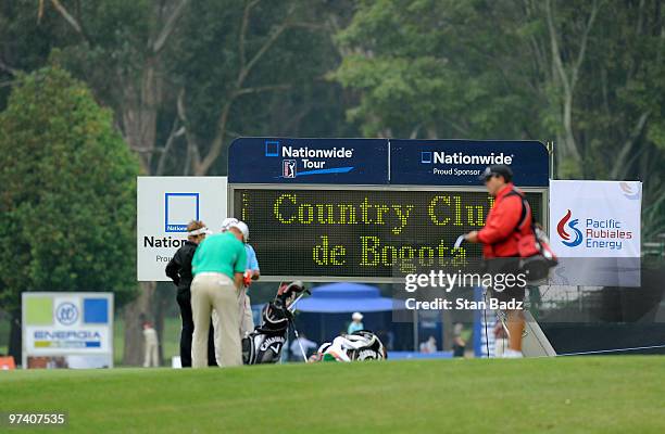 Players practice putting on the 12th green during practice for the Pacific Rubiales Bogota Open Presented by Samsung at Country Club de Bogota on...