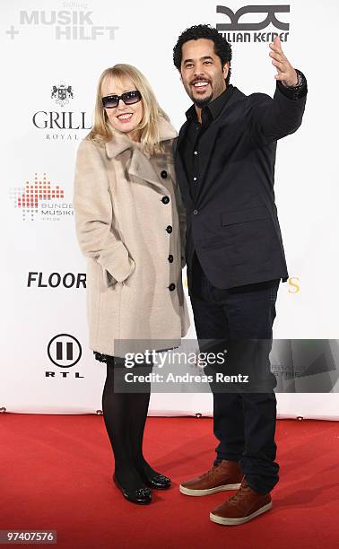 Singers Annette Humpe and Adel Tawil attend the 'Musik Hilft' charity dinner at Grill Royal on March 3, 2010 in Berlin, Germany.