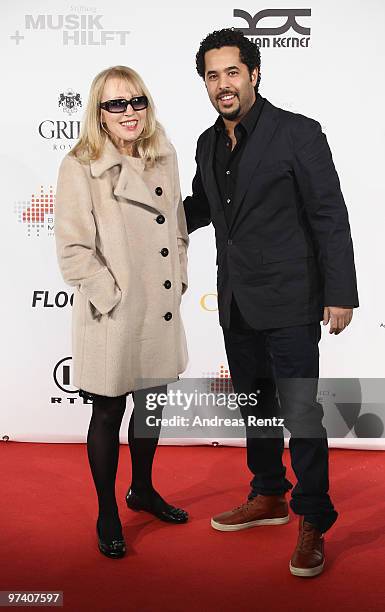 Singers Annette Humpe and Adel Tawil attend the 'Musik Hilft' charity dinner at Grill Royal on March 3, 2010 in Berlin, Germany.