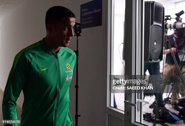 Australia's forward Tim Cahill arrives for a press conference in Kazan on June 14 ahead of the Russia 2018 World Cup football tournament. - Cahill is...