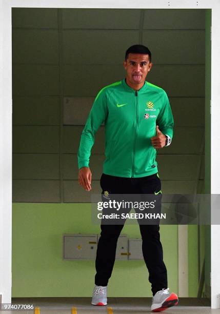 Australia's forward Tim Cahill arrives for a press conference in Kazan on June 14 ahead of the Russia 2018 World Cup football tournament. - Cahill is...