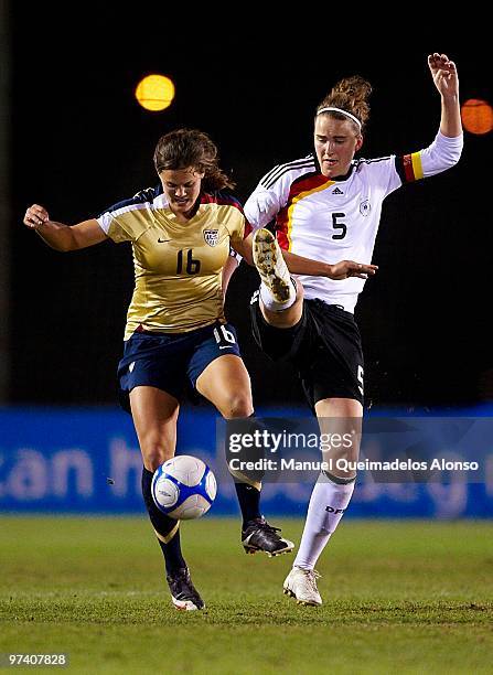 Valeria Kleiner of Germany and Katie Stengel of USA compete for the ball during the women's international friendly match between Germany and USA on...