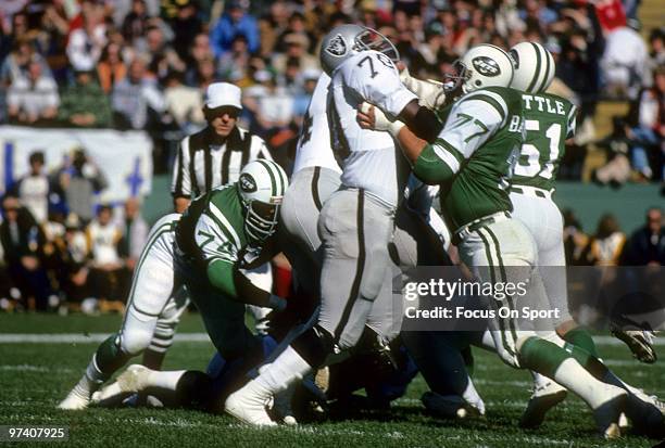Offensive tackle Art Shell of the Oakland Raiders in action blocks defensive tackle Carl Barzilauskas of the New York Jets October 23, 1977 during an...