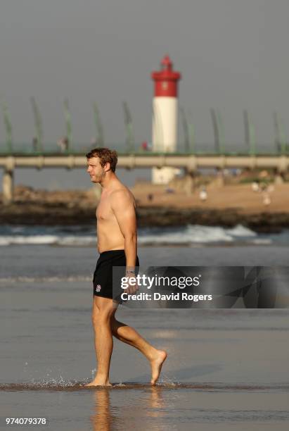 Joe Launchbury, the England lock, walks in the Indian Ocean during the England recovery session held on June 14, 2018 in Umhlanga Rocks, South Africa.