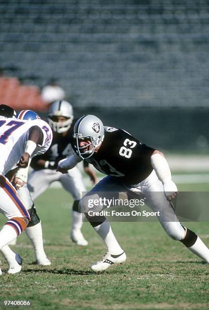 S: Linebacker Ted Hendricks of the Los Angeles Raiders in action guarding tight end James Wright of the Denver Broncos circa early 1980's during an...