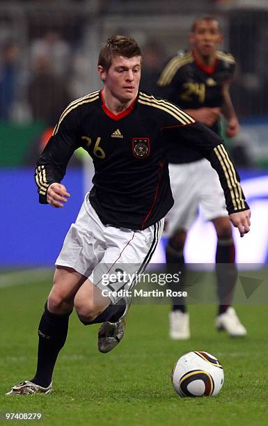 Toni Kroos of Germany runs with the ball during the International Friendly match between Germany and Argentina at the Allianz Arena on March 3, 2010...