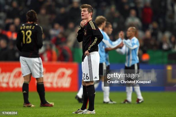 Mario Gomez and Toni Kroos of Germany look dejected after losing 0-1 the International Friendly match between Germany and Argentina at the Allianz...