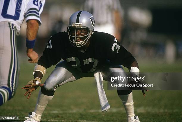 S: Defensive back Lester Hayes of the Oakland Raiders in action guarding wide receiver Steve Largent of the Seattle Seahawks circa early 1980's...