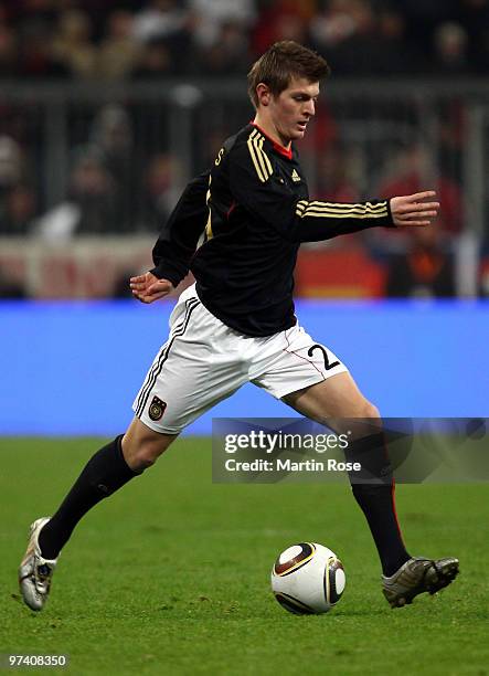 Toni Kroos of Germany runs with the ball during the International Friendly match between Germany and Argentina at the Allianz Arena on March 3, 2010...