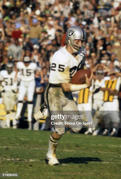 Wide Receiver Fred Biletnikoff of the Oakland Raiders in action races towards the endzone against the Minnesota Vikings during Super Bowl XI on...