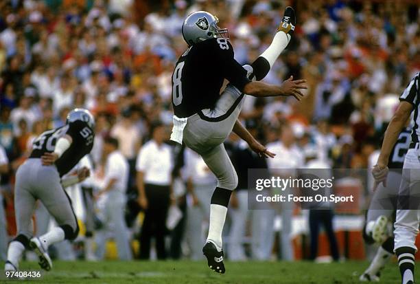 S: Punter Ray Guy of the Los Angeles Raiders in action punting circa mid 1980's during a NFL football game at the Los Angeles Coliseum in Los...