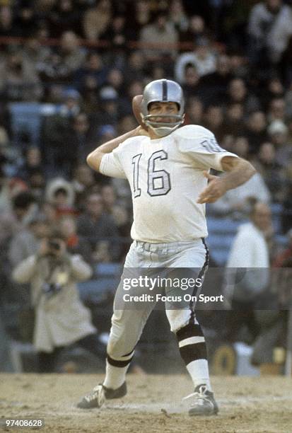Quarterback/Kicker George Blanda of the Oakland Raiders sets to throw a pass against the Baltimore Colts during the NFL football AFC Conference...