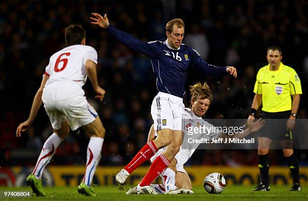 Steven Whittaker of Scotland is closed down by Jan Rajnoch of Czech Republic during the International Friendly match between Scotland and the Czech...