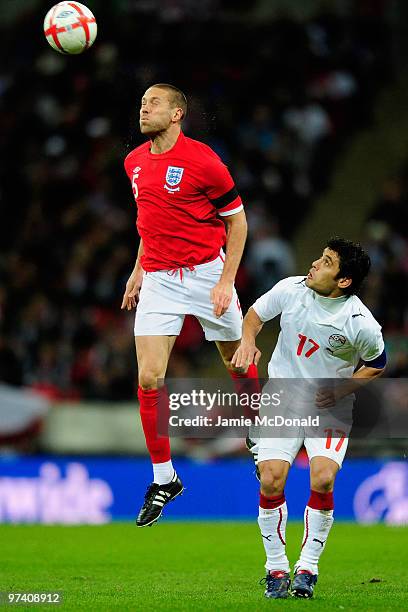 Matthew Upson of England beats Ahmed Hassan of Egypt to the header during the International Friendly match between England and Egypt at Wembley...