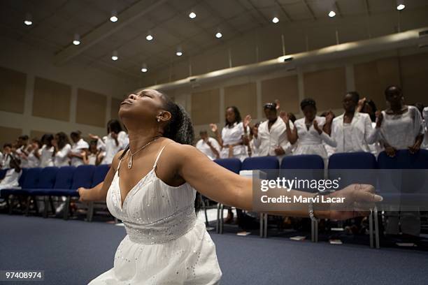 Holywood Retreat founder and organizer Ceecee Michaela pray at the alter during the Purity Ring Ceremony at the Destiny World Church June 16, 2007 in...