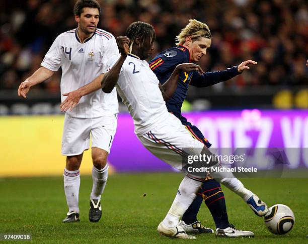 Fernando Torres of Spain challenged by Bacary Sagna during the during the International friendly match betweem France and Spain at the Stade de...