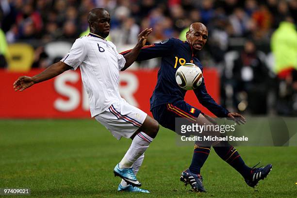 Lassana Diarra of France challenges Marcos Senna during the during the International friendly match betweem France and Spain at the Stade de France...