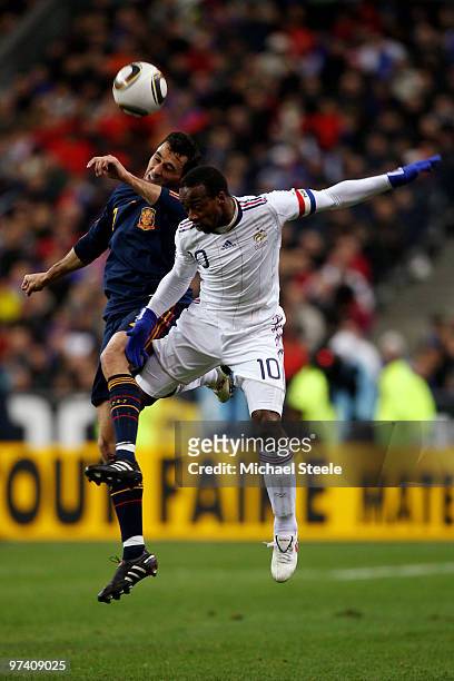 Sidney Govou of France challenged by Alvaro Arbeloa during the during the International friendly match betweem France and Spain at the Stade de...